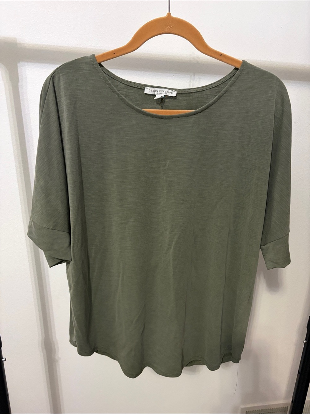 Green envelope elbow sleeve top